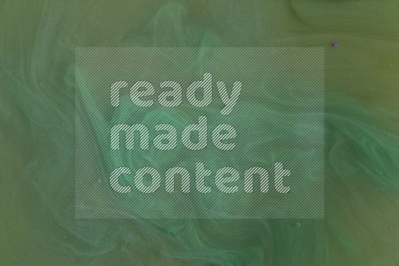 تلتقط الصورة تناثرا للطلاء الأخضر علي خلفية بيضاء