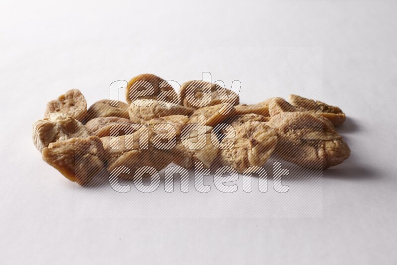 Dried figs on white background