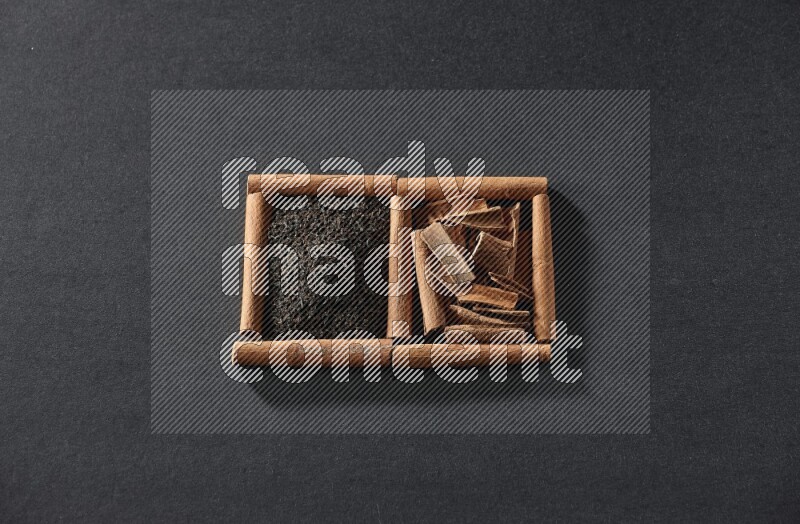 2 squares of cinnamon sticks full of tea and cinnamon on black flooring