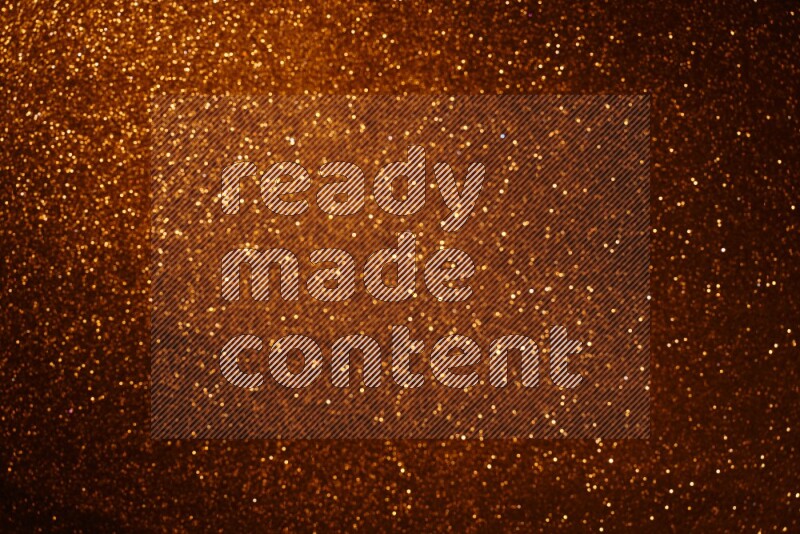 Orange glittery bokeh background