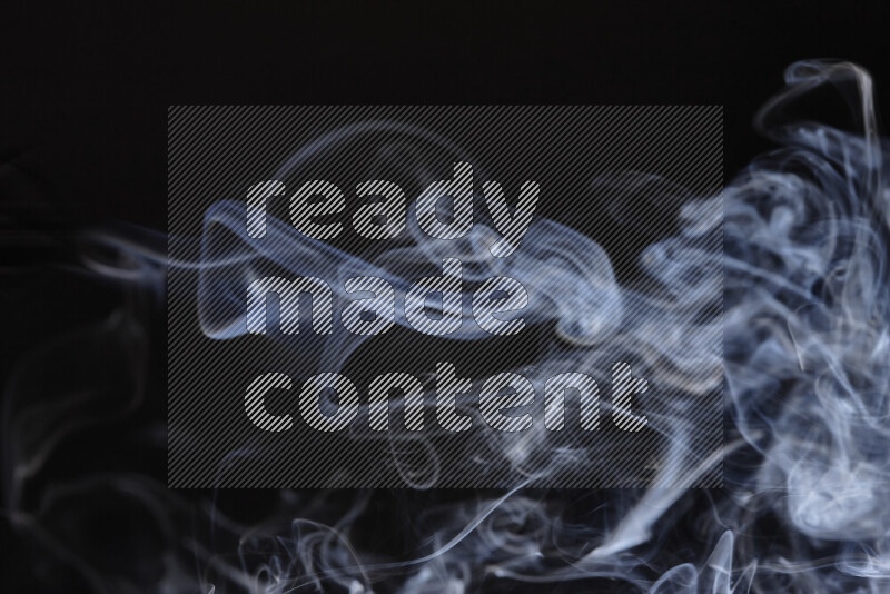 Motion of wavy smoke isolated on dark background