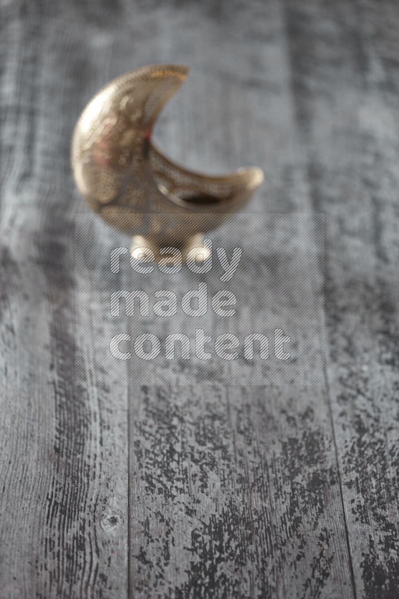 A lantern placed on a wooden background