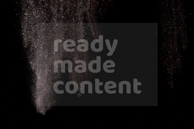Multicolored glitter powder isolated on black background