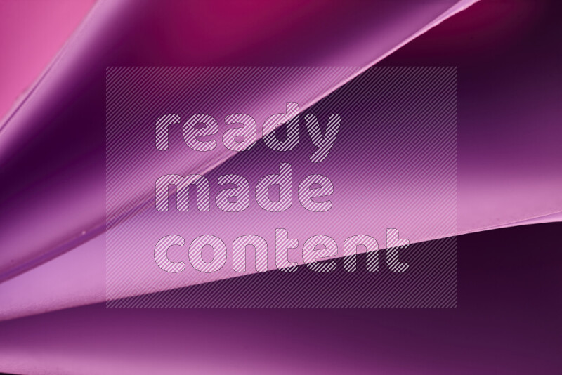 An abstract art piece displaying smooth curves in warm and cold gradients created by colored light