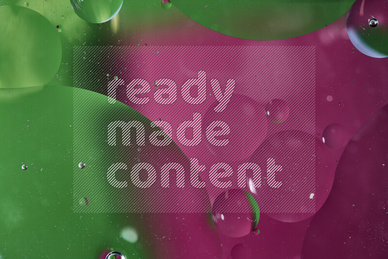 Close-ups of abstract oil bubbles on water surface in shades of green and pink