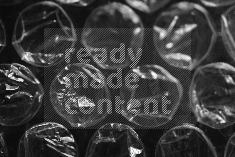 Bubble wrap texture on black background
