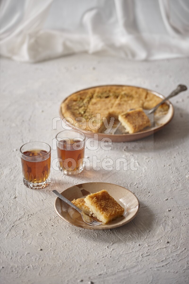 Konafa with tea in a light setup