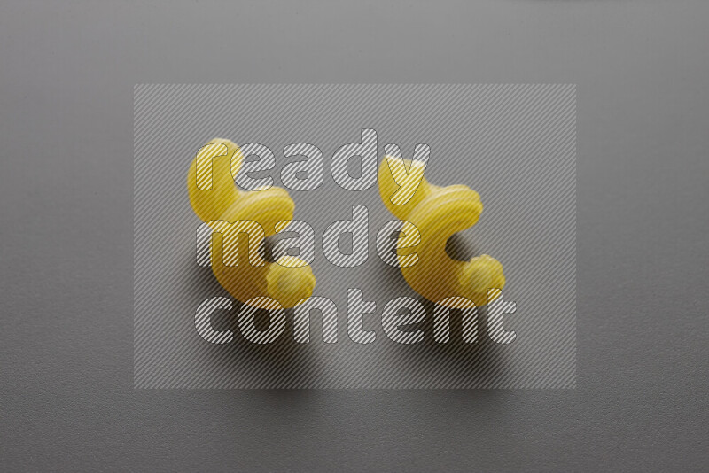 Twist pasta on grey background