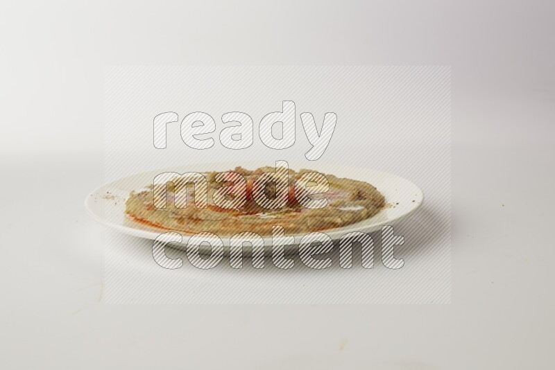 fava bean in a white plate direct on a white background
