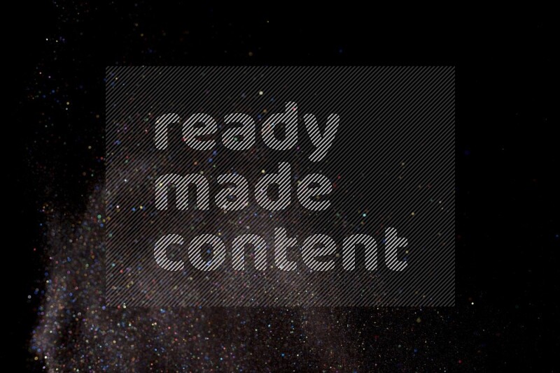 Multicolored glitter powder isolated on black background