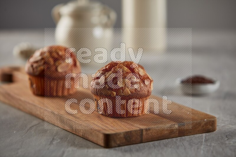Almond cupcake on a wooden board