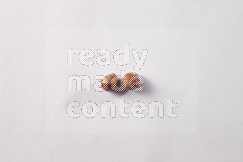 Hazelnuts on white background