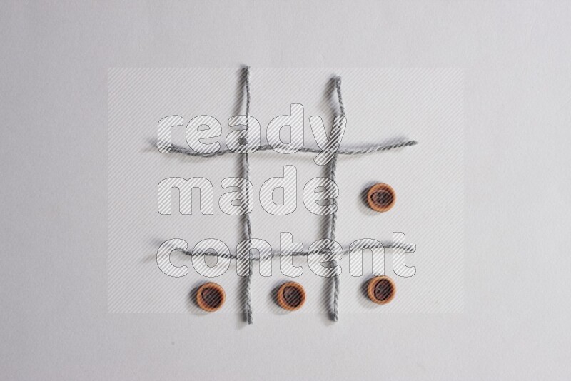 Wooden buttons placed on grey background