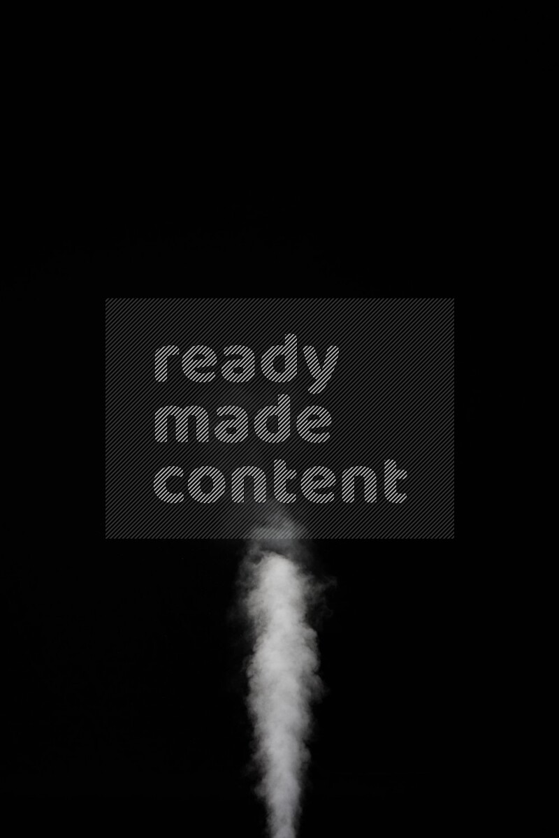 irregular white smoke on black background.