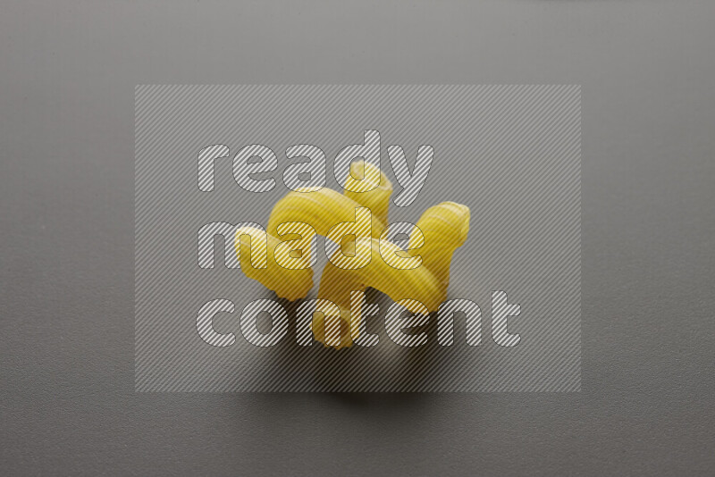Twist pasta on grey background