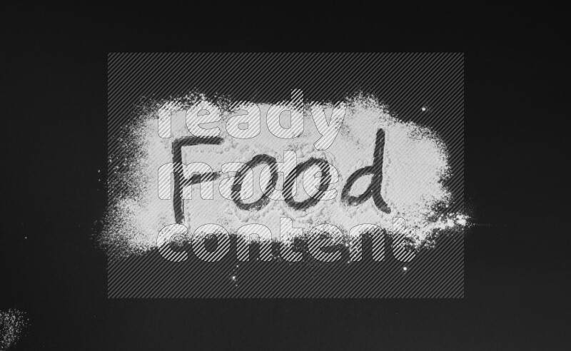 A word written with powder on black background
