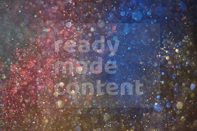 Multicolored glitter powder isolated on black background