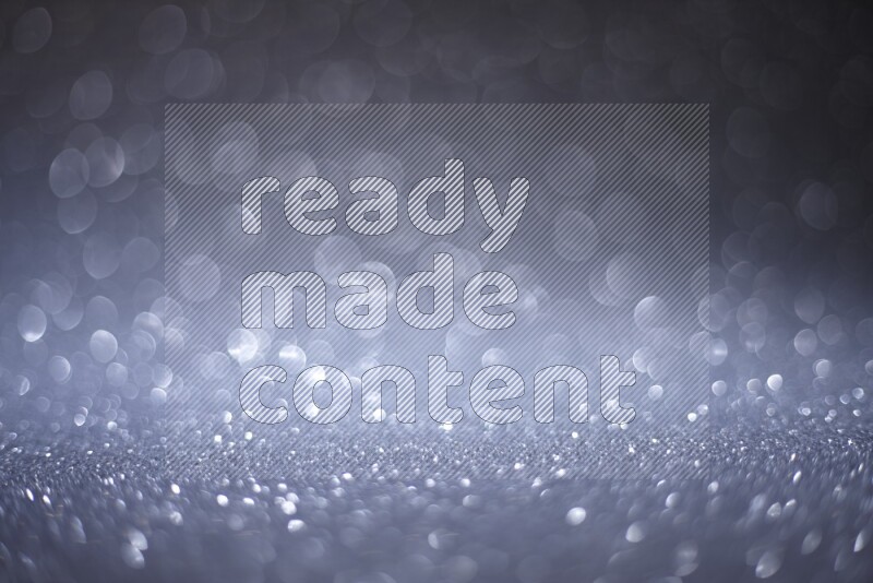 Silver glittery bokeh background