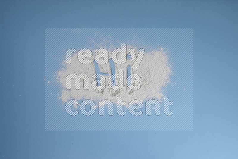 A word written with white powder on blue background