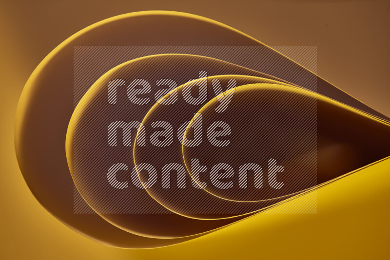 فن تجريدي لورق مطوي على شكل منحنيات ناعمة بتدرجات اللون الذهبي