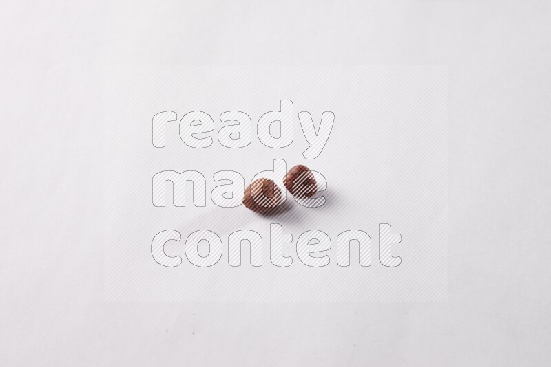 Hazelnuts on white background