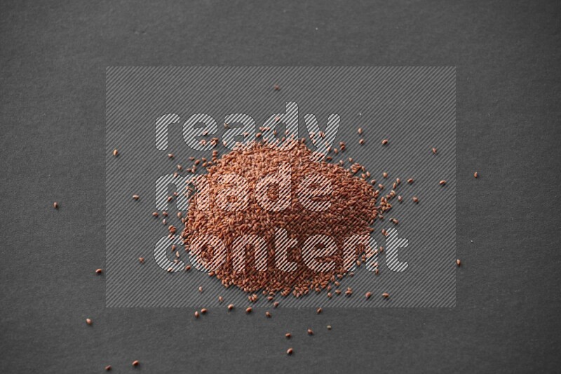 Garden cress on a black flooring