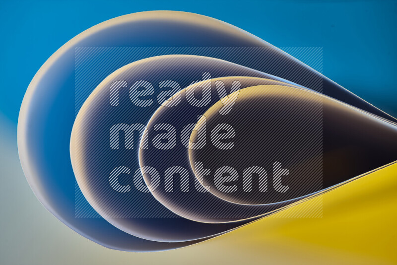 An abstract art of paper folded into smooth curves in blue and yellow gradients