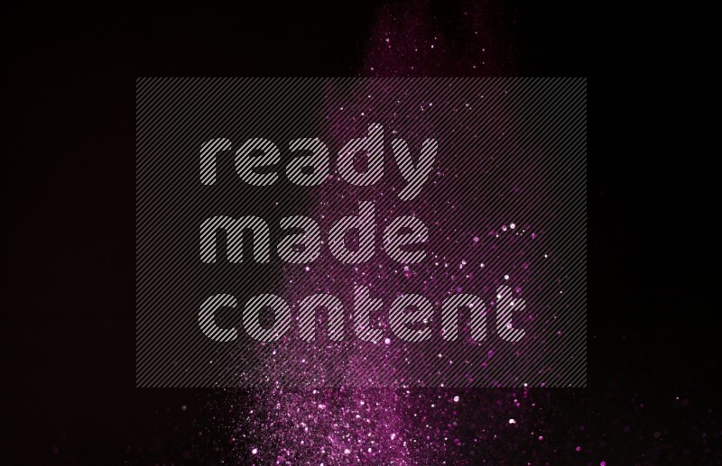 Pink glitter powder isolated on black background