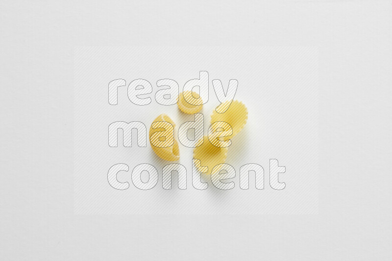 Different pasta types on white background