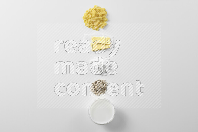 White sauce pasta recipes ingredients on white background