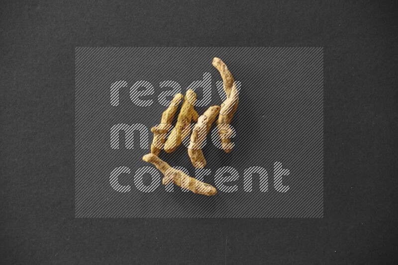 Turmeric on a black flooring