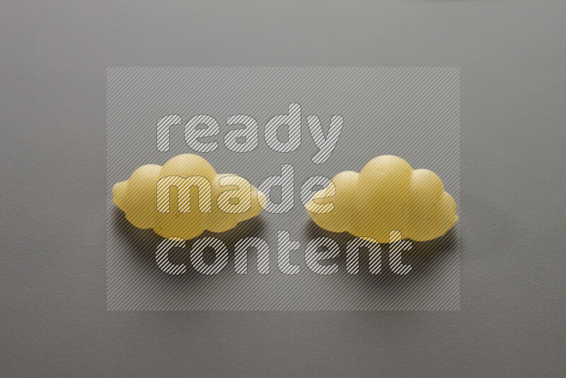 Snails pasta on grey background