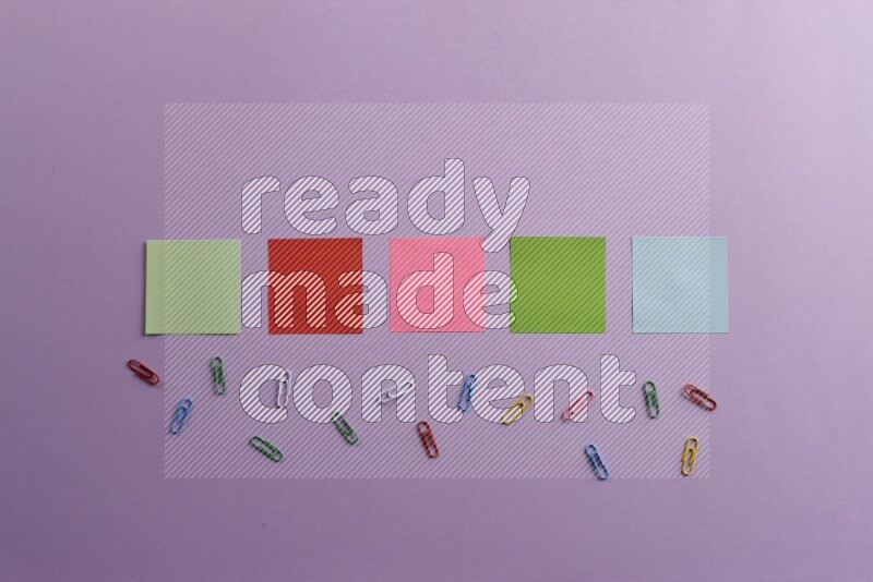 Multicolored sticky notes with school supplies on purple background