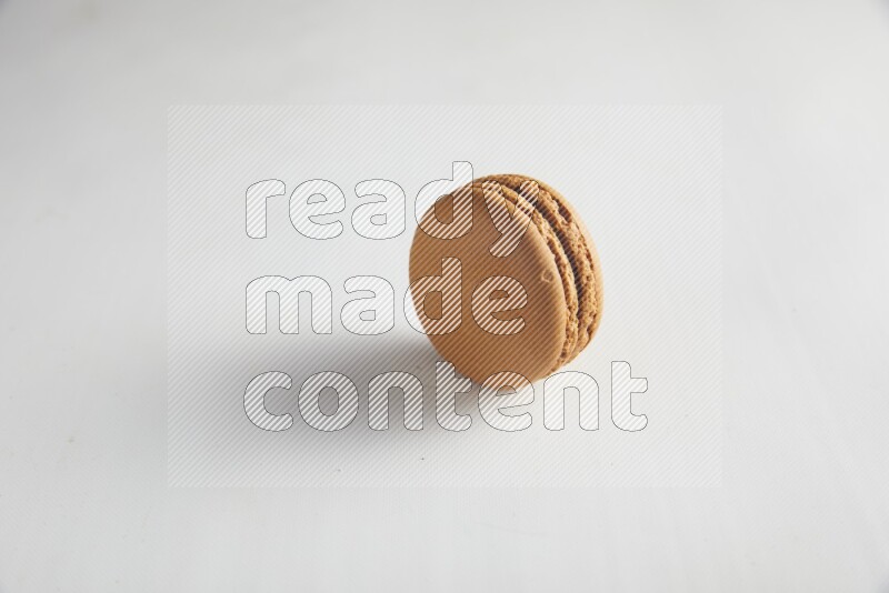 45º Shot of Brown Maple Taffy macaron on white background