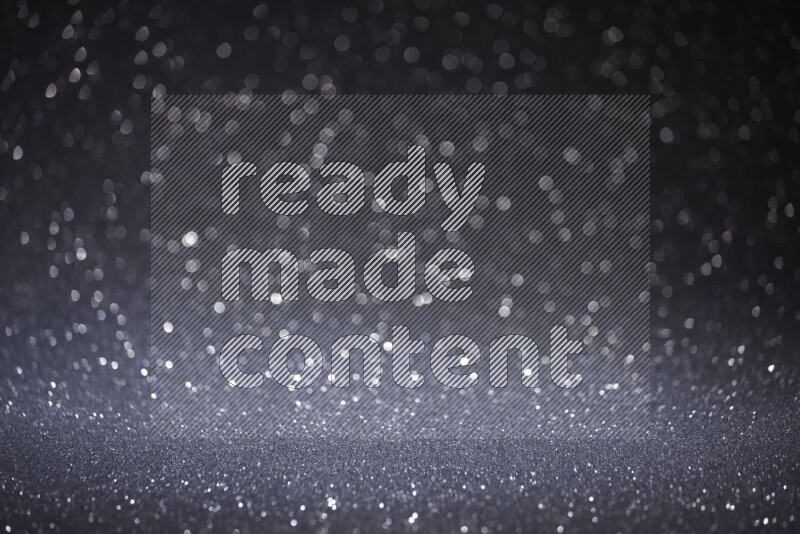 Black glittery bokeh background