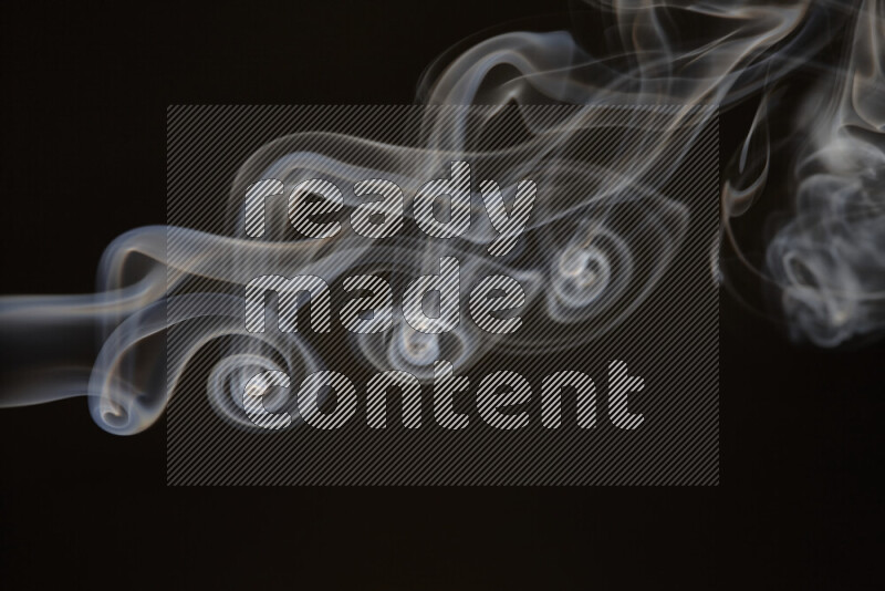 Motion of wavy smoke isolated on dark background