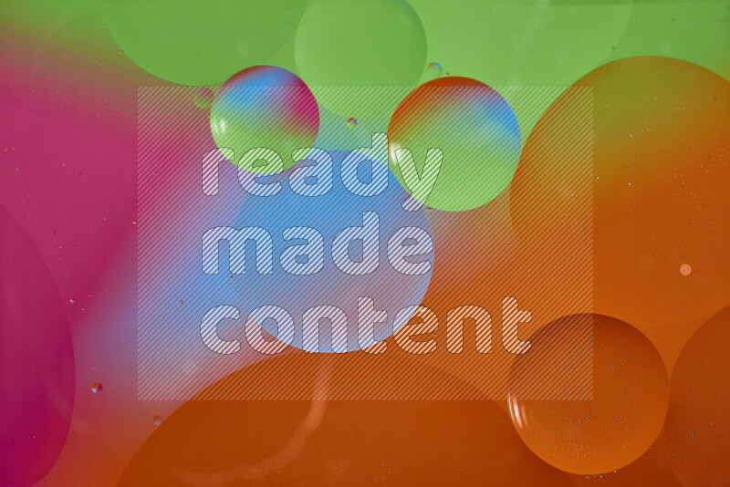 Close-ups of abstract oil bubbles on water surface in multicolors