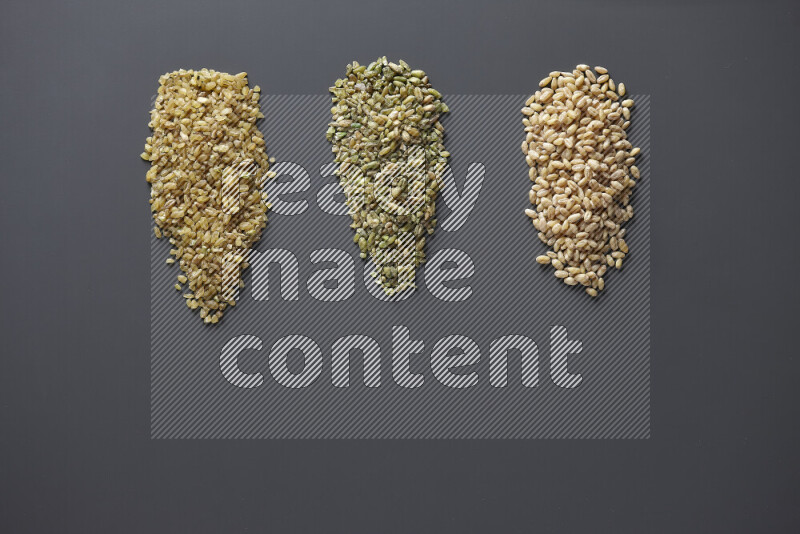 Bunches of legumes on grey background