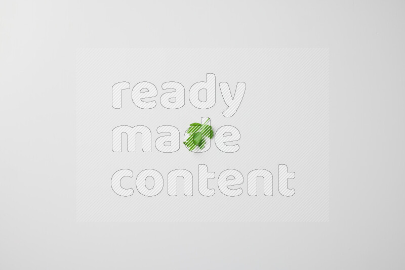 Scattered fresh parsley leaves on white background
