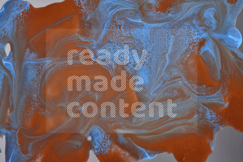 Abstract colorful background with mixed of orange and blue paint colors