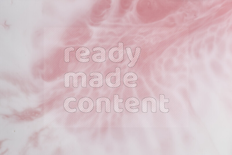 A close-up of abstract swirling patterns in red and white