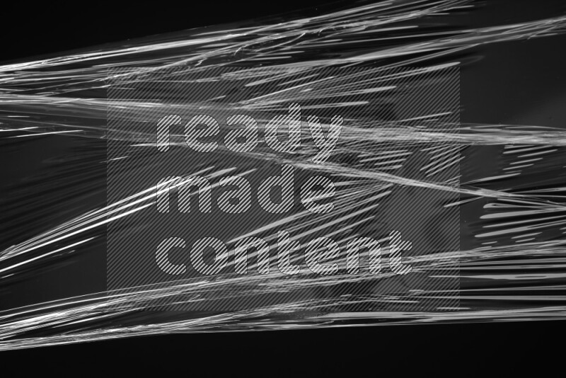 Plastic wrap texture on black background