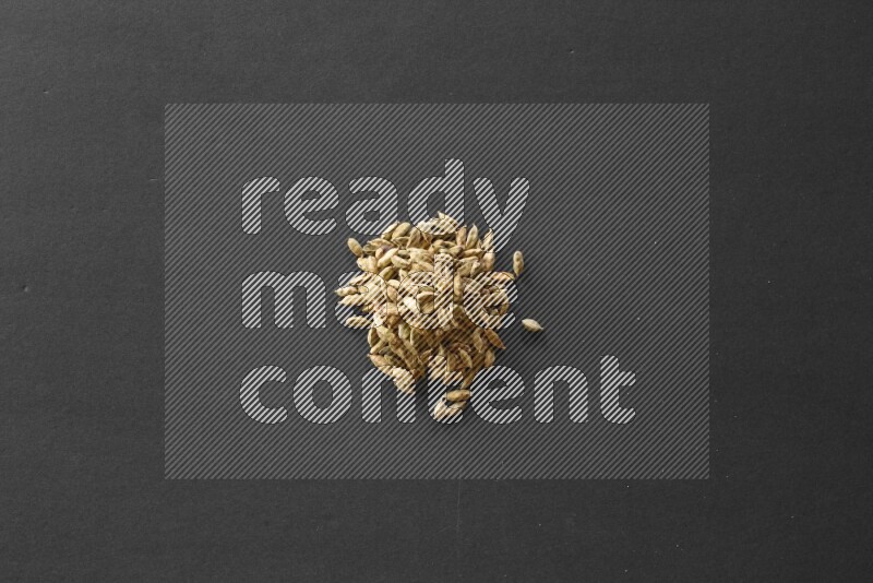 Cardamom on a black flooring