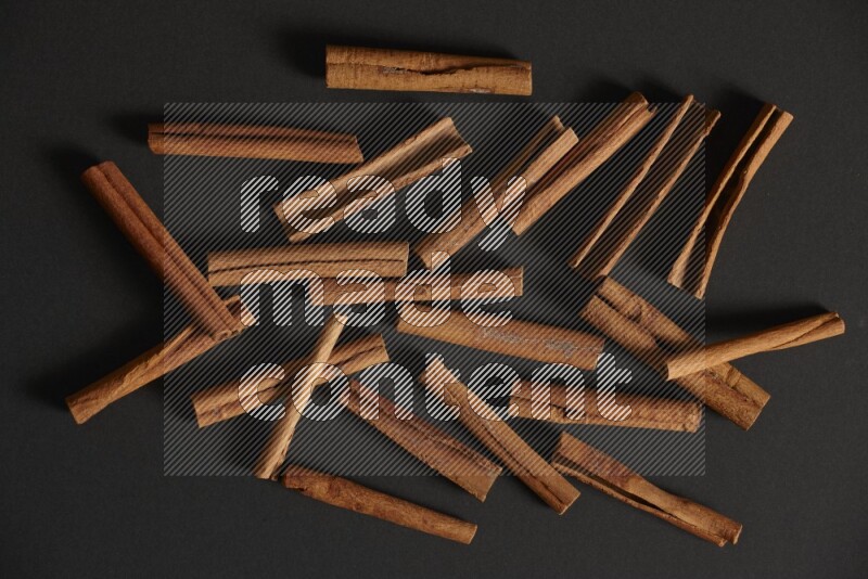 Cinnamon sticks on black background