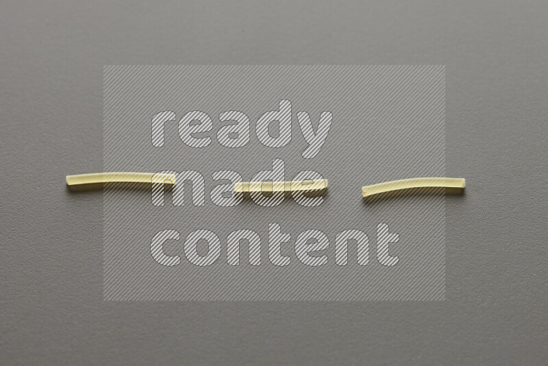 Vermicelli pasta on grey background