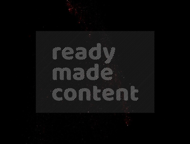 Red glitter powder isolated on black background
