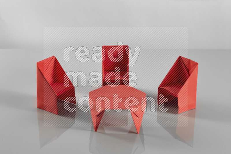 Origami dinning room on grey background