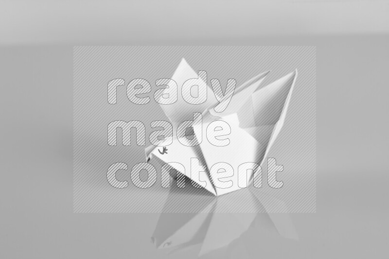 Origami animals on grey background