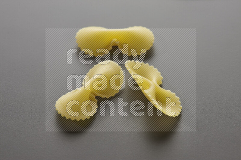 Fiocchi pasta on grey background
