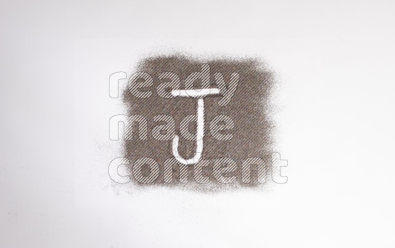 Alphabets written with glitter on white background